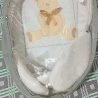 آغوشی نوزاد.ولباس نوازد