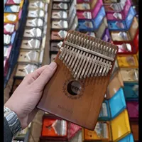 سنتور چوب گردو ولنتاین (کالیمبا هدیه)|سازهای سنتی|شیراز, سینما سعدی|دیوار