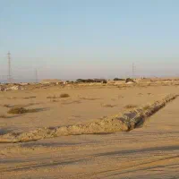 زمین تلمبو ۱۴۰ متر بر خیابان اصلی ( ابعاد ۱۲در۱۲ )