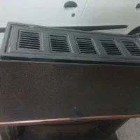 بخاری طرح شومینه|بخاری، هیتر، شومینه|مهاجران, |دیوار