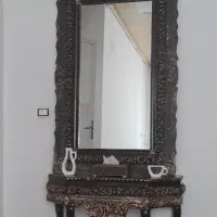 آینه.ساعت.زیر تلوزیون