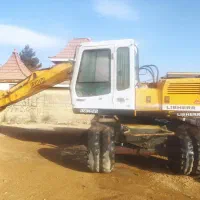 بیل میکانیکی چرخ لاستیکی|خودرو سنگین|بومهن, |دیوار