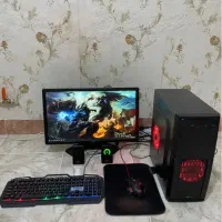 کیس گیمینگ با مانیتور و اسپیکر و موس و کیبورد