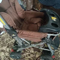 کالسکه و کریر نوزاد همراه ساک و روروئک