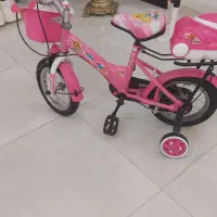 دوچرخه سایز۱۲ اصلا استفاده نشده فقط کنار بوده