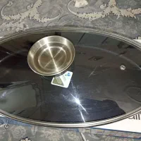 تابه ماهی سرخ کن|ظروف پخت‌وپز|آفتاب, |دیوار