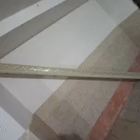 کتیبه برجسته زمینه شیری برجسته گیهایی طلایی