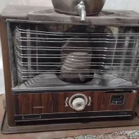 یک بخاری نفتی در برابر نو