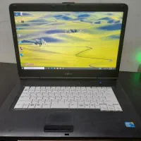 لپ تاپ‌ و یک کامپیوتر