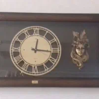 فروش لوستر و ساعت دیواری