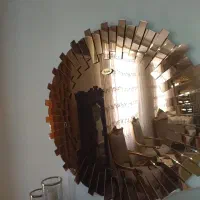 اینه خورشیدی و صندلی