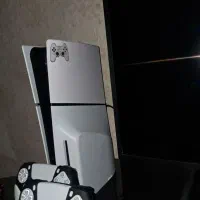کنسول بازی PS5 اسلیم استاندارد و یک لپتاپ ایسوس