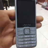 گوشی ساده جی ال یک و منبع 709