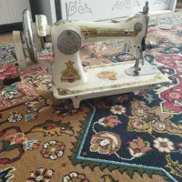 چرخ خیاطی سفید رنگ مدل شیر