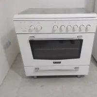 اجاق گاز فر دار و جوجه گردان آلتون