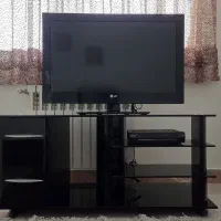تلویزیون ۳۲ اینچ  LG به همراه میز