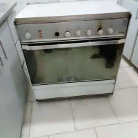 اجاق گاز فردار و بدنه کولر ابی و ۳ در ب اتاق