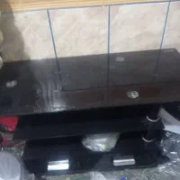 زیر تلویزیونی شیشه ای