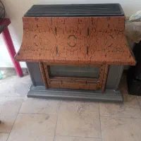 بخاری گازی طرح شومینه