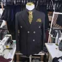 کارگاه و تولیدی عمده  کت و شلوار مردانه و بچگانه