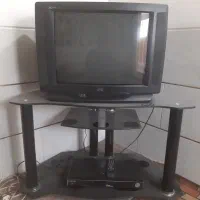 تلویزیون و دستگاه dvd و میز تلوزیون