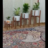 پایه گل و کارهای چوبی.پاسماوری میز بار