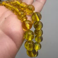 تسبیح سندلوس کهربا حشره دار