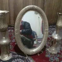 اینه و شمعدان برنجی