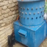 دستگاه پر کن مرغ باقفسه