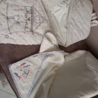 قنداق فرنگی صدفی و حوله نوزادی