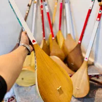 دمبوره هزارگی و قطغنی|سازهای سنتی|باقرشهر, |دیوار