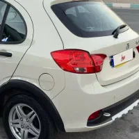 سواری کوئیک R دنده ای کرم مشکی مدل ۱۴۰۱