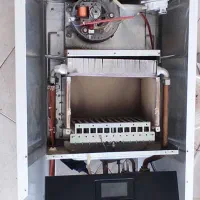 تعمیرات تضمینی انواع پکیج آبگرمکن و گاز صفحه ای|خدمات پیشه و مهارت|یزد, |دیوار