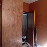 سلام کمد دیوار جنس ام دی اف جا دار با یک تخت تاشو