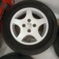 رینگ ۲۰۷ با لاستیک هانکوک ۱۹۵|قطعات یدکی و لوازم جانبی|صدرا-فارس, فاز ۱|دیوار