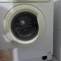 لباس شوی  قدیمی|ماشین لباسشویی و خشک‌کن لباس|بومهن, |دیوار