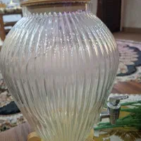 دو عدد جا شمعی و دو دسته گل وکلمن شربتی ودکور