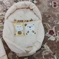 کیسه خواب و اغوشی نوزاد