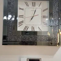 ساعت دیواری ایینه