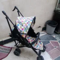 یک عدد کالسکه با تخت توری