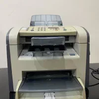 دستگاه پرینتر لیزری hp1319mf