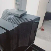 تلویزیون ال جی با میز ودستگاه ست تاپ باکس