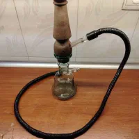 قلیان مسافرتی با کوله و کمی ذغال کمر چوب