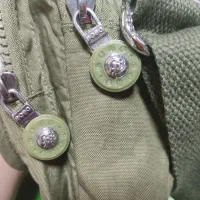 کیف|کیف، کفش، کمربند|مشهد, پایگاه شکاری|دیوار