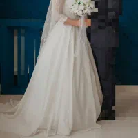 لباس عروس همراه با تور و ژپون سه فنره