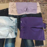 تعدادی شلوار جین و مانتو