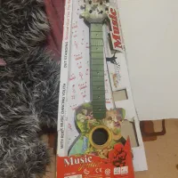 خرسی بزرگ وگیتاردخترانه|اسباب‌بازی بچه|نورآباد, |دیوار