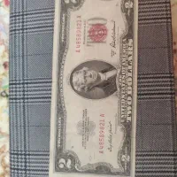 ۲ دلاری مهر قرمز و ۱ دلاری مهر آبی