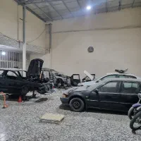 همکاری با مکانیک و زیر و بند و برق کار خودرو