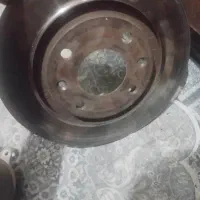 یک عدد کمک جلو پژو و یک عدد دیسک چرخ جلو پژو|قطعات یدکی و لوازم جانبی|بم, |دیوار